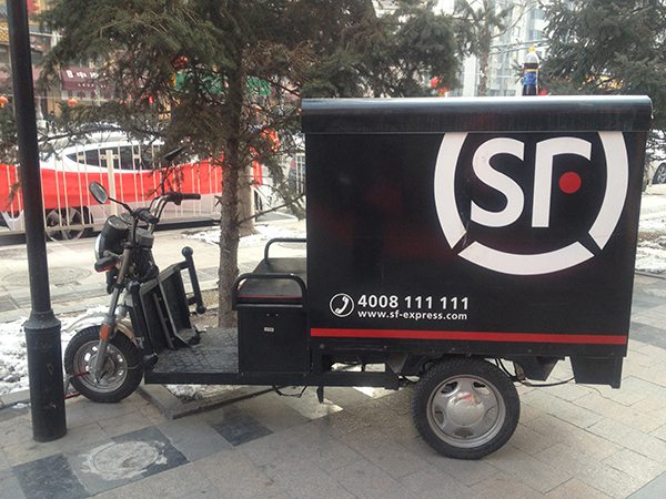 An SF Express delivery truck in downtown Beijing