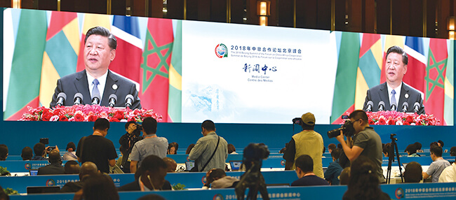 Xi Jinping announcing an aid and investment package for Africa