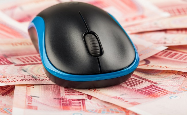 computer mouse on chinese money yuan studio shoot