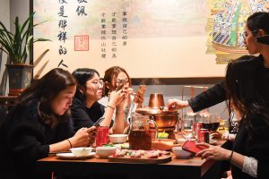 Customers at hotpot restaurant Haidilao