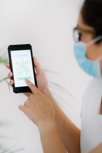 man displaying a contact-tracing app
