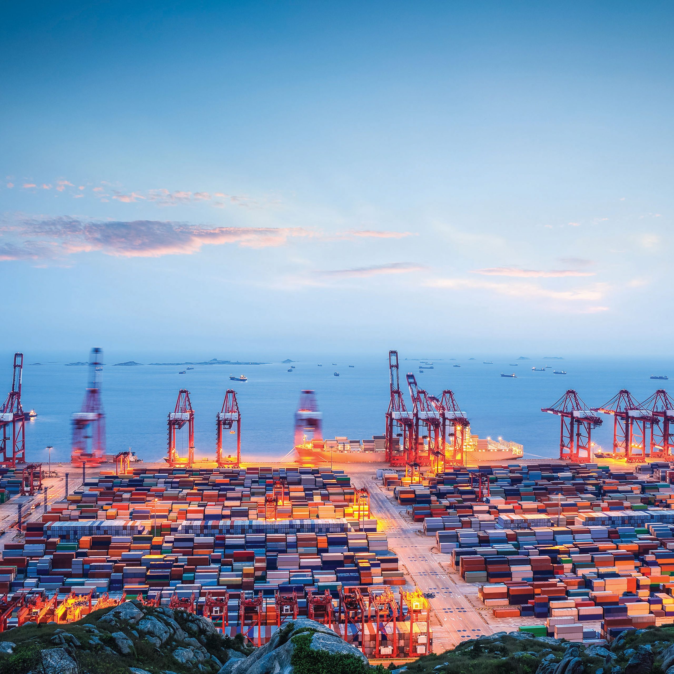 Shanghai container terminal in twilight ablaze with lights - CKGSB Knowledge