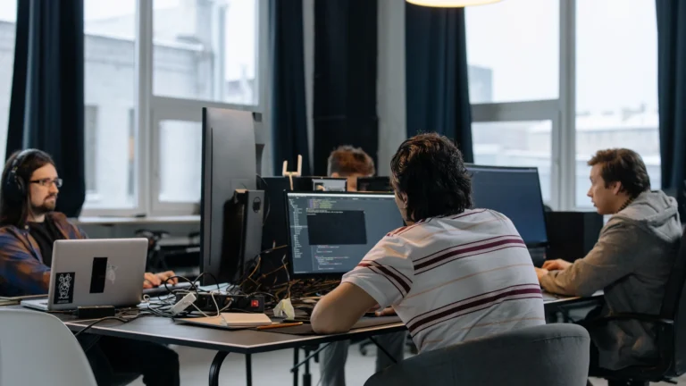 Developers working at computers in a shared office