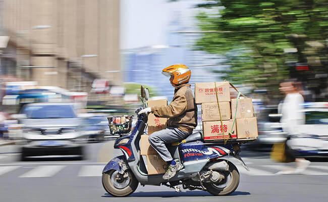 A delivery worker in Shanghai
