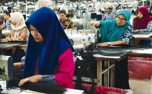 workers in a southeast Asia factory, part of the new world supply chain