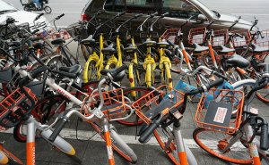 Photo of row of bikes owned by bike-sharing companies
